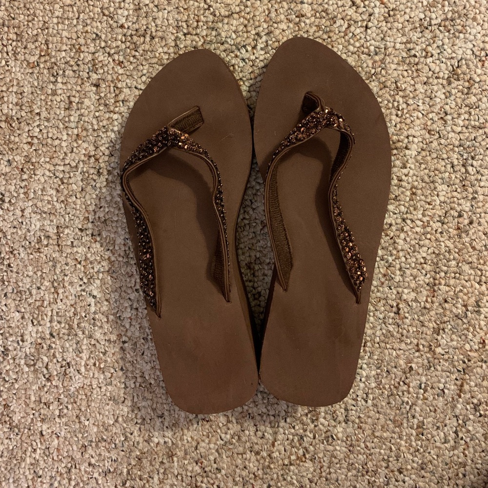 Size 9 flip flop sandals. Brown with bling on straps.
